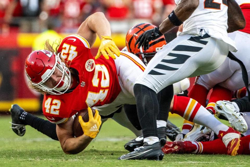 Kansas City Chiefs running back Carson Steele (42) is brought down by Cincinnati Bengals safety Geno Stone (22) in the fourth quarter during an NFL game on Sunday, Sept. 15, 2024, at GEHA Field at Arrowhead Stadium.