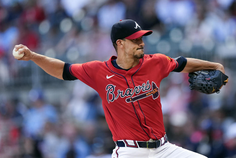 Atlanta Braves pitcher Charlie Morton (50) works against the Pittsburgh Pirates in the first inning of a baseball game Friday, June 28, 2024, in Atlanta. (AP Photo/John Bazemore)
