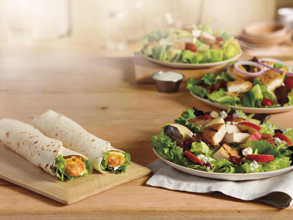 The chain will debut 400-calorie snack wraps and salads on its new menu.