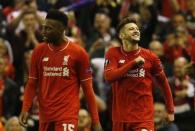 Britain Football Soccer - Liverpool v Villarreal - UEFA Europa League Semi Final Second Leg - Anfield, Liverpool, England - 5/5/16. Adam Lallana celebrates with Daniel Sturridge after scoring the third goal for Liverpool. Reuters / Phil Noble