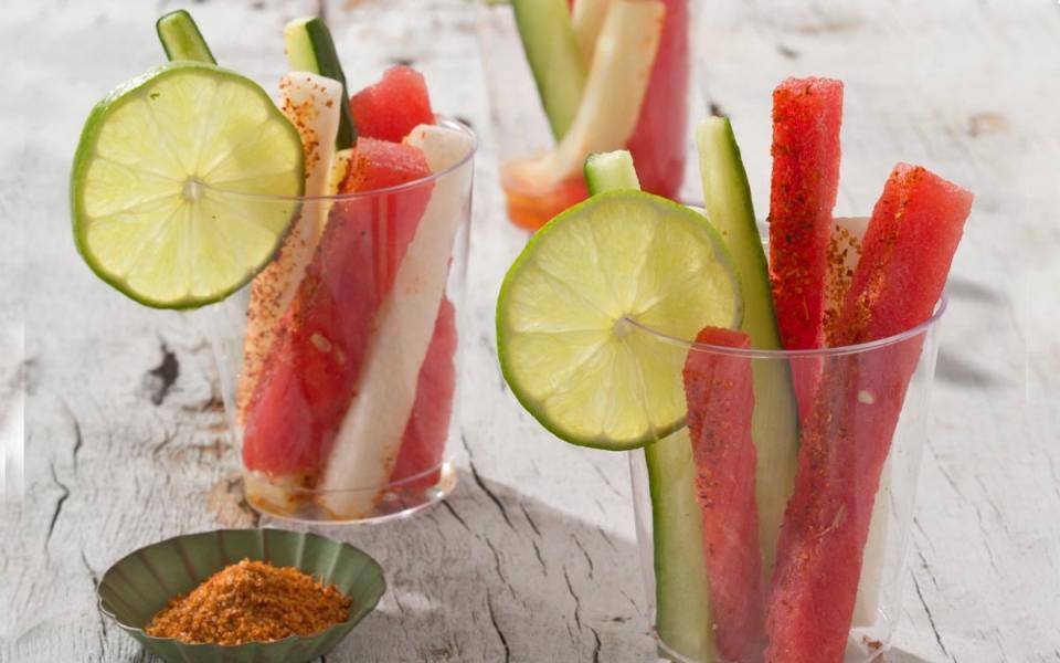 <p>Mark Boughton Photography</p><p>This spicy appetizer features a delightful mix of sweet (watermelon) and savory (cucumber and jicama). As far as low-carb goes, there are no added sugars in this recipe, so it's perfect for keto and low-carb diets. Skip the cucumber or mix in other veggies to create a festive color palette for your celebration. </p><p><strong>Get the recipe: <a href="https://parade.com/661479/alison-ashton/chile-lime-watermelon-cucumber-and-jicama/" rel="nofollow noopener" target="_blank" data-ylk="slk:Chili-Lime Watermelon Cucumber and Jicama Cups;elm:context_link;itc:0;sec:content-canvas" class="link ">Chili-Lime Watermelon Cucumber and Jicama Cups</a></strong></p>