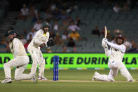 West Indies' Tagenarine Chanderpaul, right, bats against Australia on the second day of their cricket test match in Adelaide, Friday, Nov. 9, 2022. (AP Photo/James Elsby)