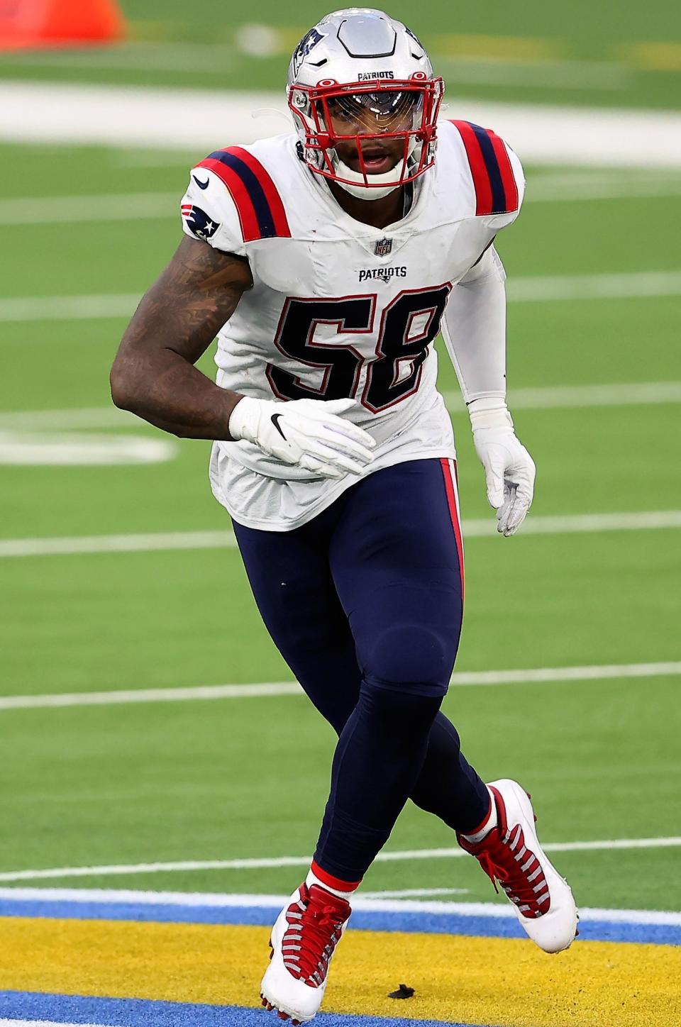 Patriots linebacker Anfernee Jennings works in the defensive backfield during the game against the Los Angeles Chargers in December 2020.