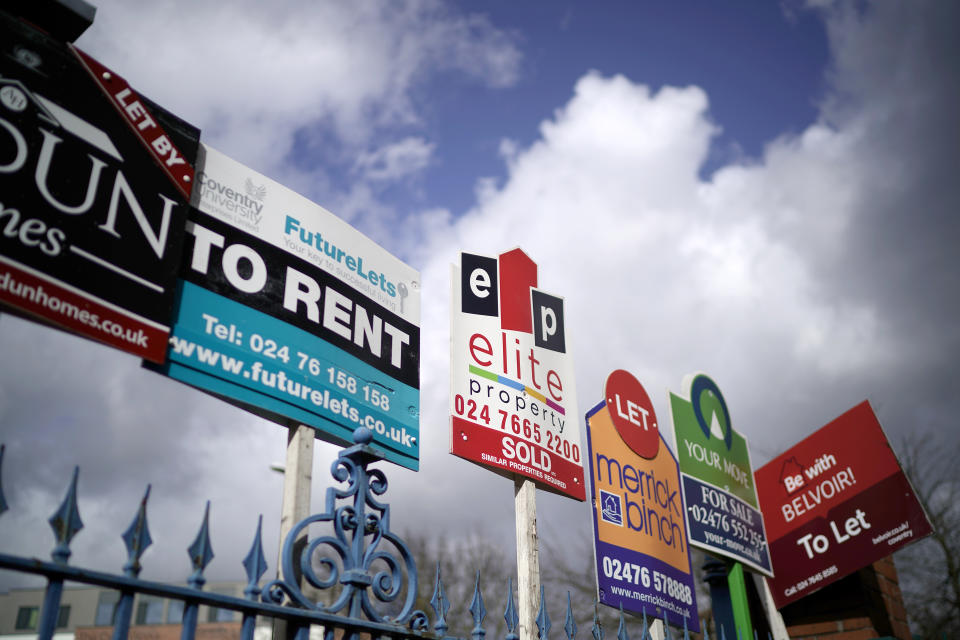 Estate agent ‘For Sale’ and ‘To Let’ signs adorn a fence next to houses on March 14, 2019 in Coventry, England. Photo: Christopher Furlong/Getty Images