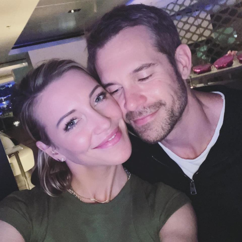 Katie Cassidy smiles in selfie with Stephen Huszar