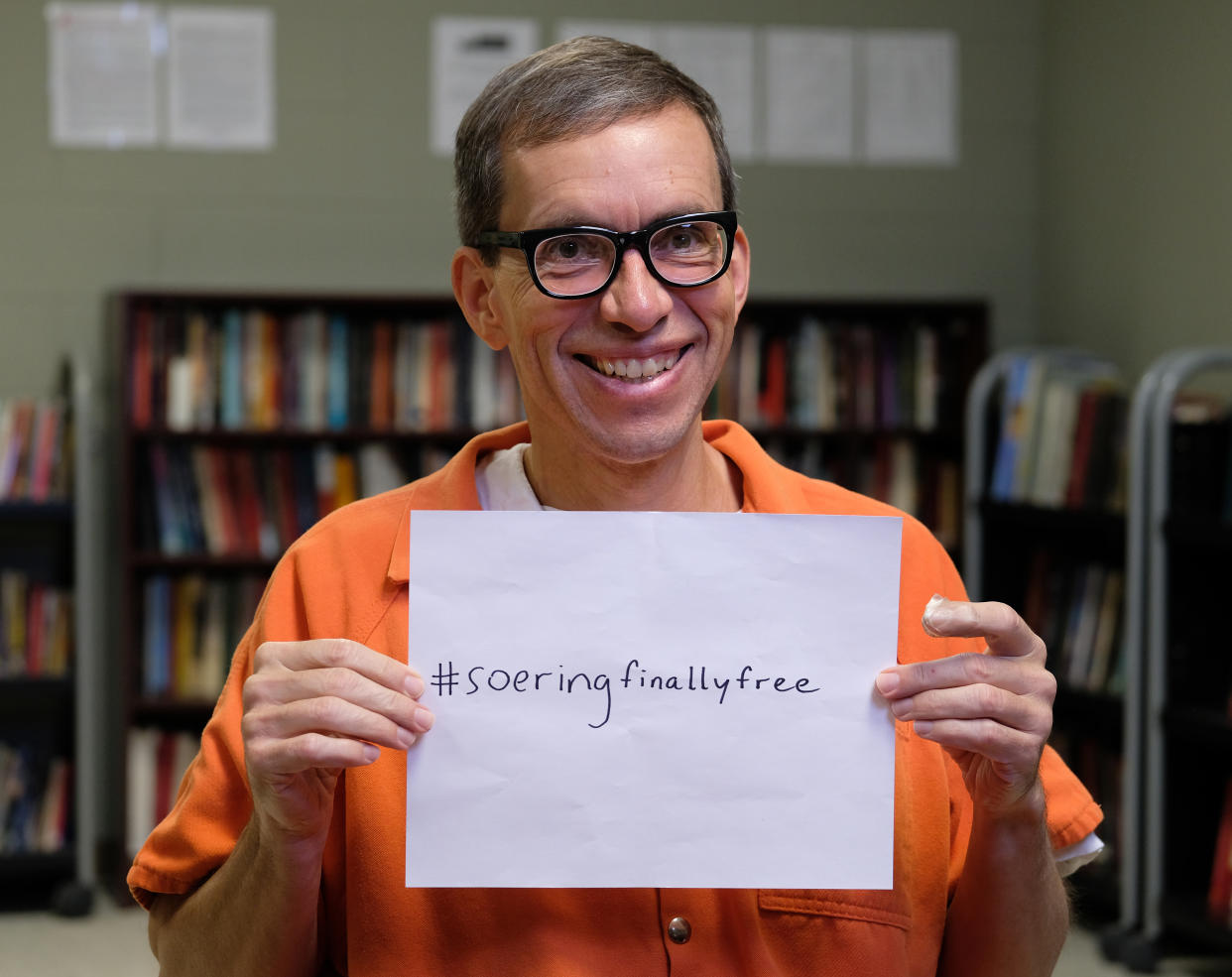  Jens Soering holds up a sign that he plans to use for his social media after he's deported back to Germany, where he hopes to be a motivational speaker. Soering is being detained at the U.S. Immigration and Customs Enforcements Farmville Detention Center in Farmville, VA, Friday, December 6, 2019. 