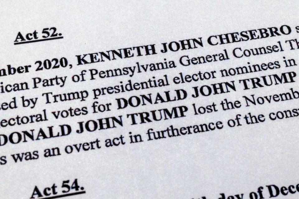 PHOTO: The indictment in Georgia against former President Donald Trump is photographed Aug. 14, 2023. Trump and several allies have been indicted in Georgia over efforts to overturn his 2020 election loss in the state. (Jon Elswick/AP)