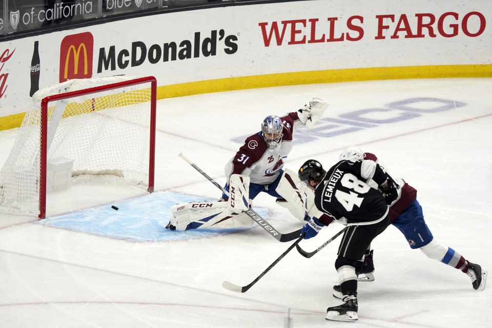 Los Angeles Kings left wing Brendan Lemieux (48) scores past Colorado Avalanche goaltender Philipp Grubauer (31) during the first period of an NHL hockey game Friday, May 7, 2021, in Los Angeles. (AP Photo/Marcio Jose Sanchez)