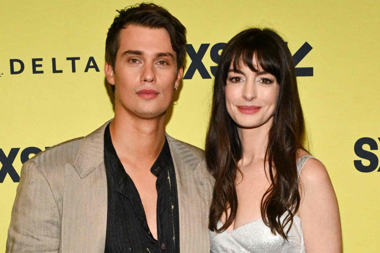 <p>Michael Buckner/SXSW Conference & Festivals via Getty</p> Nicholas Galitzine and Anne Hathaway at SXSW in March 2024