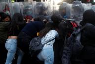 Abortion rights campaigners clash with police in Mexico City