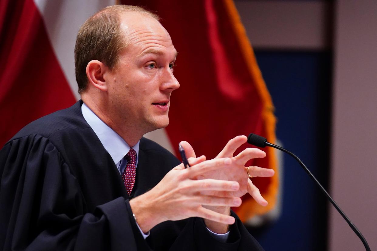 Judge Scott McAfee speaks during a hearing in Superior Court of Fulton County as part of the Georgia election indictments on Friday, Dec. 1, 2023 in Atlanta.