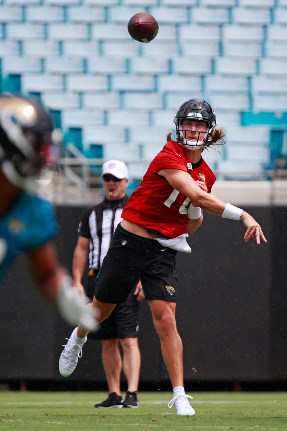 Jacksonville Jaguars quarterback Trevor Lawrence (16) participates in an organized team activity Monday, June 6, 2022 at TIAA Bank Field in Jacksonville. 