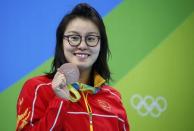 2016 Rio Olympics - Swimming - Women's 100m Backstroke Victory Ceremony - Olympic Aquatics Stadium - Rio de Janeiro, Brazil - 08/08/2016. Fu Yuanhui (CHN) of China (PRC) pose with her medal REUTERS/David Gray