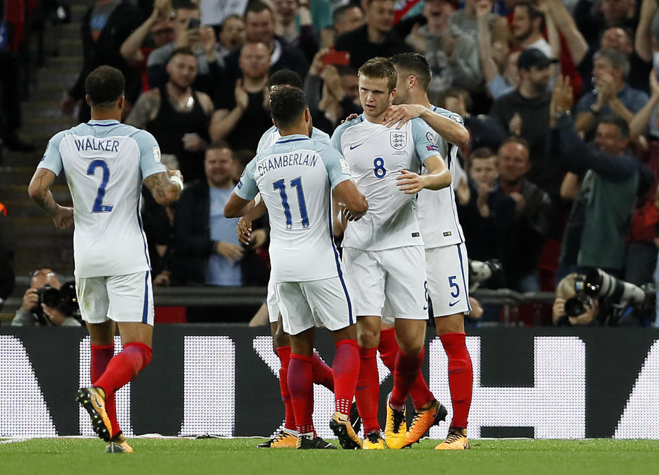 <p>England’s Eric Dier is celebrated by teammates after scoring during the World Cup Group F qualifying soccer match between England and Slovakia at Wembley Stadium in London, England, Monday, Sept. 4, 2017. (AP Photo/Kirsty Wigglesworth) </p>