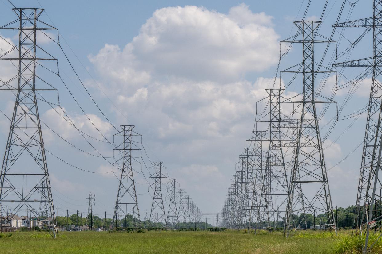 Transmission towers are seen at the CenterPoint Energy powerplant in Houston, Texas. 