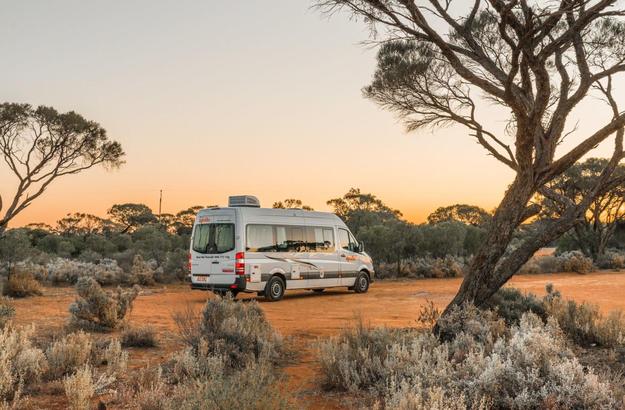 Port Augusta, AUSTRALIA - Oct 01, Australian rented motorhome stopped in at bush campgroung in Flinders Ranges region near Port Augusta at sunset.
