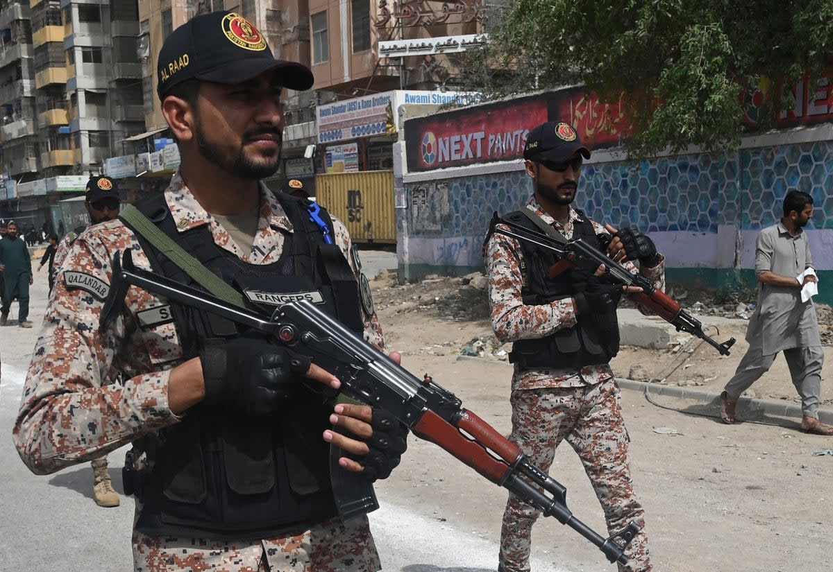 Security personnel patrol along a street in Karachi (AFP via Getty Images/ Representative image)