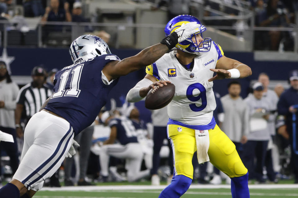 Dallas Cowboys linebacker Micah Parsons (11) sacks Los Angeles Rams quarterback Matthew Stafford (9) during the first half of an NFL football game Sunday, Oct. 29, 2023, in Arlington, Texas. (AP Photo/Michael Ainsworth)