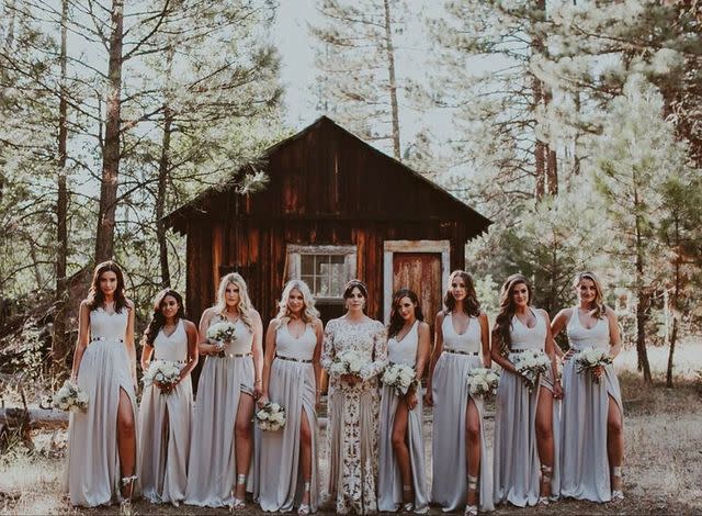 <p>Katie Maloney’s rustic-chic wedding featured her co-stars Stassi Schroeder, Brittany Cartwright, Kristen Doute, and Scheana Marie. The women of <em>Vanderpump Rules </em>owned the aisle in <a href="https://www.brides.com/story/vanderpump-rules-katie-maloney-bridesmaid-dresses" rel="nofollow noopener" target="_blank" data-ylk="slk:grey, floor-length dresses;elm:context_link;itc:0;sec:content-canvas" class="link ">grey, floor-length dresses</a> with a slit.</p><p><a href="https://www.instagram.com/p/BR3xiKZFGyR/?utm_source=ig_embed" rel="nofollow noopener" target="_blank" data-ylk="slk:See the original post on Instagram;elm:context_link;itc:0;sec:content-canvas" class="link ">See the original post on Instagram</a></p>