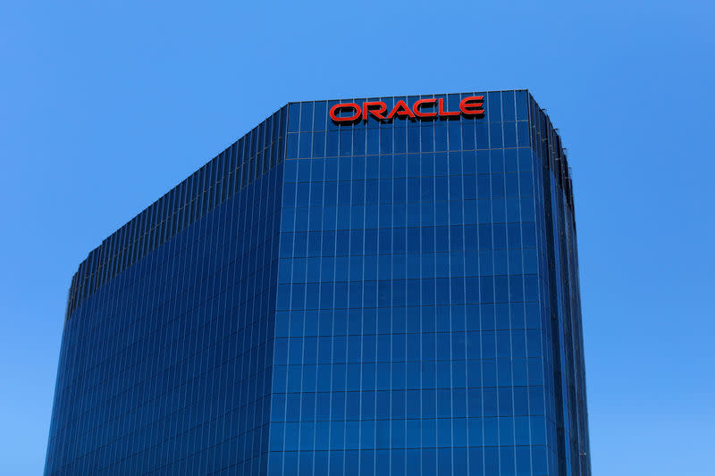 FILE PHOTO: The Oracle logo is shown on an office building in Irvine, California, U.S. June 28, 2018. REUTERS/Mike Blake