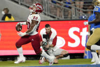 Fresno State running back Ronnie Rivers (20) celebrates his touchdown against UCLA during the first half of an NCAA college football game Saturday, Sept. 18, 2021, in Pasadena, Calif. (AP Photo/Marcio Jose Sanchez)