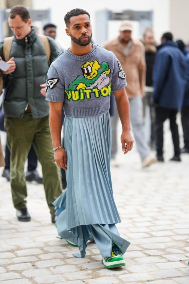 Emily In Paris' Star Lucien Laviscount Ditches His Suits for a Baby Blue  Skirt at Paris Fashion Week