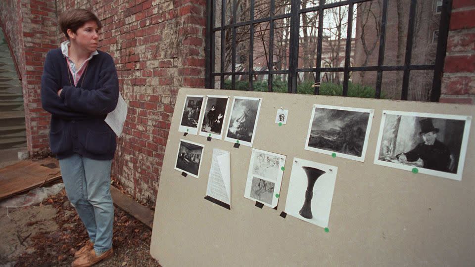 Karen Haas, acting curator at the Isabella Stewart Gardner Museum in Boston, speaks during a 1990 news conference outside the museum that highlighted photos of the stolen artwork. - Tom Herde/The Boston Globe/Getty Images