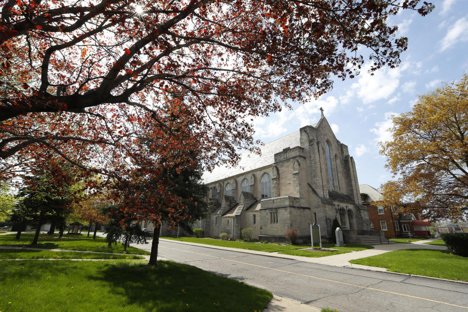 This Monday, May 6, 2019 photo shows The Assumption of the Blessed Virgin Mary Church, also known as Assumption Grotto, in Detroit. In the years before the Rev. Eduard Perrone helped start Opus Bono Sacerdotii, he and Assumption Grotto took in at least two priests who had been accused of sexual misconduct at dioceses in other states - including one who later admitted to molesting as many as 50 children in the 1980s and ‘90s, according to court documents in Texas. (AP Photo/Paul Sancya)