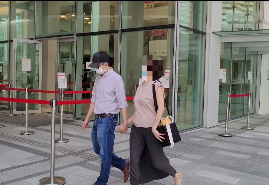 Yee Wing Kay leaving the State Courts on 28 July 2021. (PHOTO: Yahoo News Singapore/Wan Ting Koh)