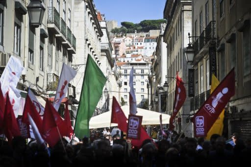 People protest against the Portuguese government's austerity policies at the Terreiro do Paco Square in Lisbon, on September 29. Thousands took to the streets of Lisbon in a new protest against government financial policies expected to get even tougher to meet pledges to creditors