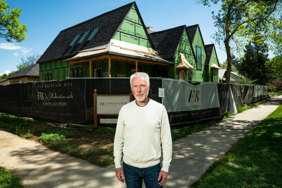 Eric Guenther stands for a portrait near a home under construction on Mountain Avenue on May 17, 2023. An attempt to historically designate the house against its new owners' wishes sparked Guenther's interest in joining the Fort Collins Historic Preservation Commission in 2022. Guenther resigned from the commission over his qualms with city code and the pathway to involuntary historic designations it provides.