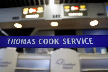 A closed Thomas Cook check-in service is pictured at the Frankfurt Airport