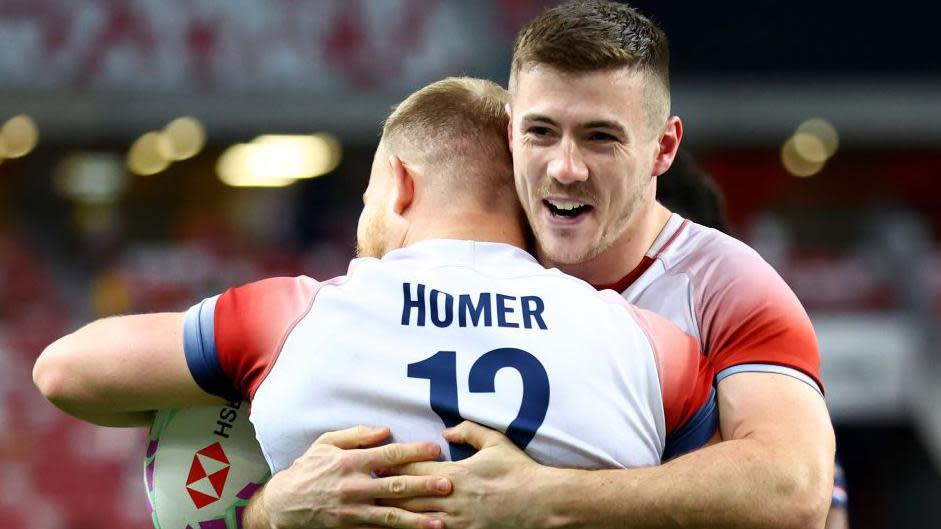  Will Homer celebrates with Charlton Kerr