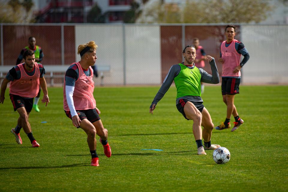 Members of the Phoenix Rising Football Club play a practice game at the soccer complex at Wild Horse Pass in Chandler on Feb. 1, 2022. Monica D. Spencer/The Republic tk