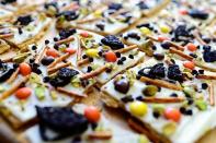 <p>Just as peppermint bark is a Christmas staple, this Halloween bark will be a staple at your Halloween parties for years to come. </p><p><strong><em>Get the recipe at <a href="https://www.thepioneerwoman.com/food-cooking/recipes/a11667/halloween-bark/" rel="nofollow noopener" target="_blank" data-ylk="slk:The Pioneer Woman;elm:context_link;itc:0;sec:content-canvas" class="link ">The Pioneer Woman</a>. </em></strong></p>