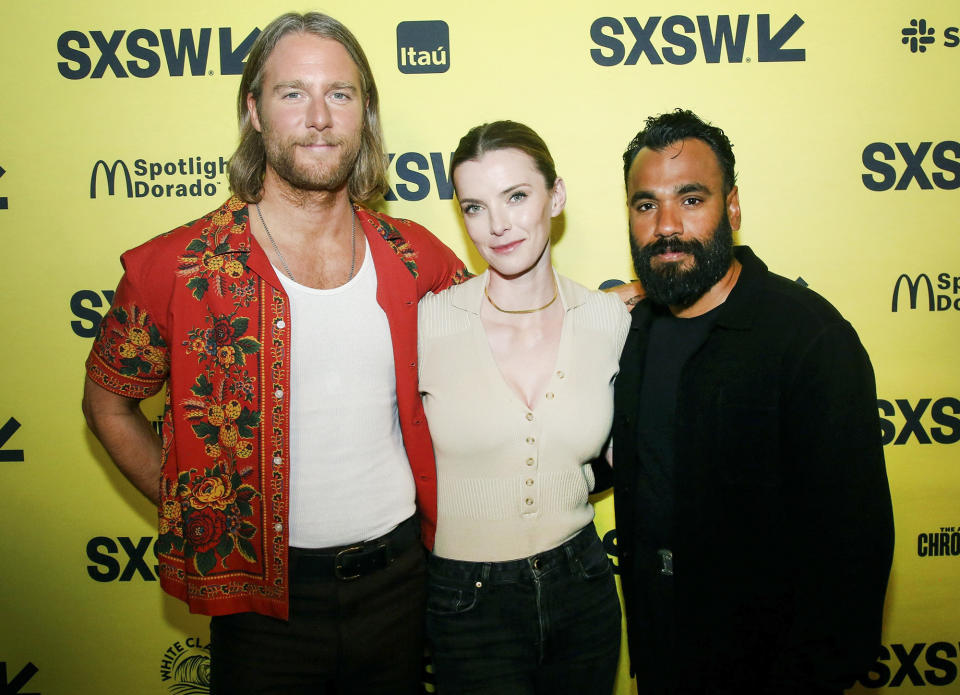 <p>Jake McDorman, <a href="https://people.com/tv/betty-gilpin-eulogy-glow-after-cancellation-netflix/" rel="nofollow noopener" target="_blank" data-ylk="slk:Betty Gilpin;elm:context_link;itc:0;sec:content-canvas" class="link ">Betty Gilpin</a> and <a href="https://people.com/tv/outer-banks-season-3-everything-to-know/" rel="nofollow noopener" target="_blank" data-ylk="slk:Andy McQueen;elm:context_link;itc:0;sec:content-canvas" class="link ">Andy McQueen</a> arrive for the world premiere of <em>Mrs. Davis</em> during the SXSW festival in Austin on March 14.</p>