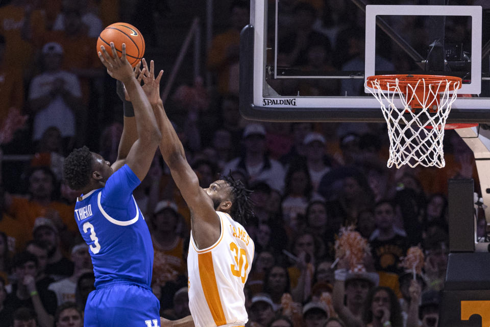 Kentucky guard Adou Thiero (3) shoots over Tennessee guard Josiah-Jordan James (30) during the first half of an NCAA college basketball game Saturday, March 9, 2024, in Knoxville, Tenn. (AP Photo/Wade Payne)