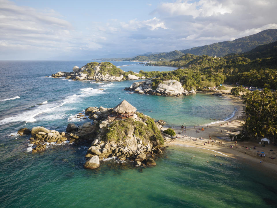 tropical beach landscape with white sand beaches and large rocks