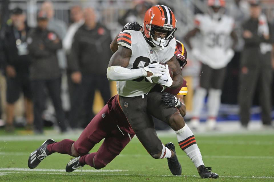 Aug 11, 2023; Cleveland, Ohio, USA; <a class="link " href="https://sports.yahoo.com/nfl/teams/cleveland/" data-i13n="sec:content-canvas;subsec:anchor_text;elm:context_link" data-ylk="slk:Cleveland Browns;sec:content-canvas;subsec:anchor_text;elm:context_link;itc:0">Cleveland Browns</a> wide receiver Austin Watkins Jr. (80) is tackled by <a class="link " href="https://sports.yahoo.com/nfl/teams/washington/" data-i13n="sec:content-canvas;subsec:anchor_text;elm:context_link" data-ylk="slk:Washington Commanders;sec:content-canvas;subsec:anchor_text;elm:context_link;itc:0">Washington Commanders</a> cornerback <a class="link " href="https://sports.yahoo.com/nfl/players/34177/" data-i13n="sec:content-canvas;subsec:anchor_text;elm:context_link" data-ylk="slk:Tariq Castro-Fields;sec:content-canvas;subsec:anchor_text;elm:context_link;itc:0">Tariq Castro-Fields</a> (26) during the second half at Cleveland Browns Stadium. Mandatory Credit: Ken Blaze-USA TODAY Sports