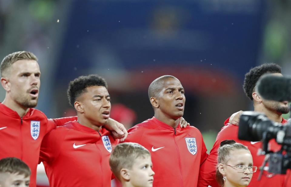 Flies surround the English team during the anthem (AP)