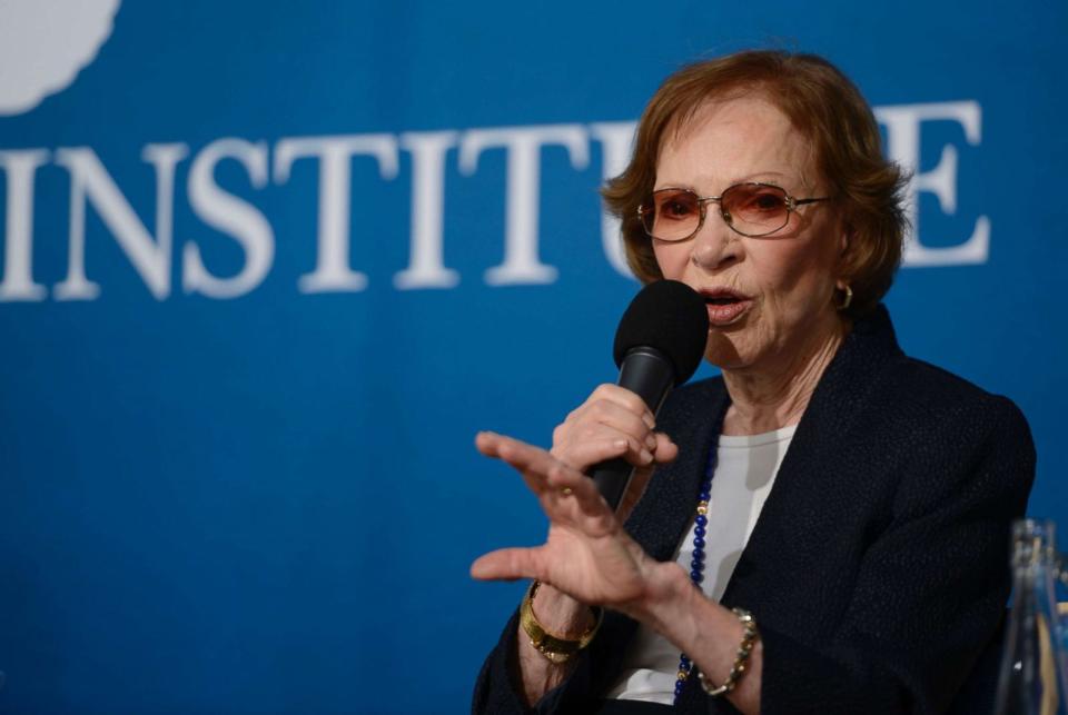 PHOTO: Former First Lady Rosalynn Carter speaks with President Jimmy Carter and Aspen Institute president and CEO Walter Isaacson during the McCloskey Speaker Series, June 23, 2015, in Aspen, Colorado. (Leigh Vogel/Getty Images, FILE)