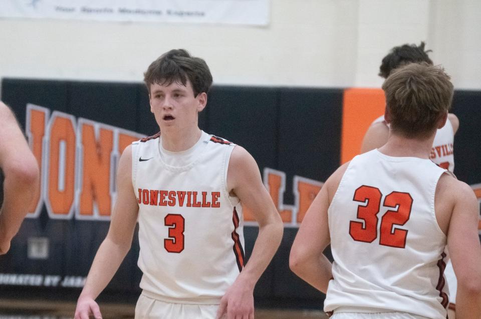 Jonesville senior Brady Wright (3) had eight rebounds and six steals to help his team defeat Reading on Friday night.