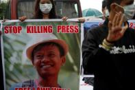 Reporters protest as they call on Myanmar government and military authorities to release reporters who were arrested in Yangon, Myanmar June 30, 2017. REUTERS/Soe Zeya Tun