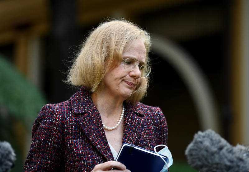 Queensland Chief Health Officer Dr Jeannette Young reacts during a press conference at Parliament House in Brisbane.