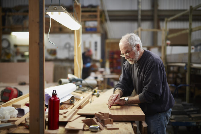 Boat-building craftsman. (Getty Images)