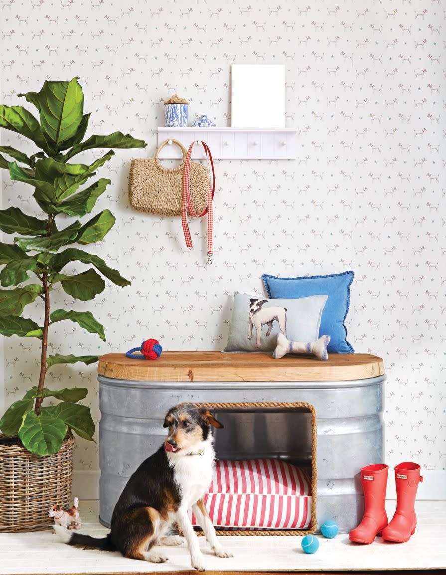 galvanized stock tank was transformed into a bench and dog bed