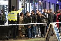 <p>A policeman directs the public away from a police cordon on London’s Carnaby Street as police deal with an incident at Oxford Circus on Nov. 24, 2017. (Photo: Rob Pinney/LNP/REX/Shutterstock) </p>