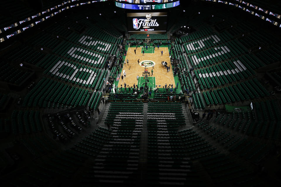 Players warm up before playing in Game 6 of basketball's NBA Finals between the Boston Celtics and the Golden State Warriors, Thursday, June 16, 2022, in Boston. (AP Photo/Michael Dwyer)