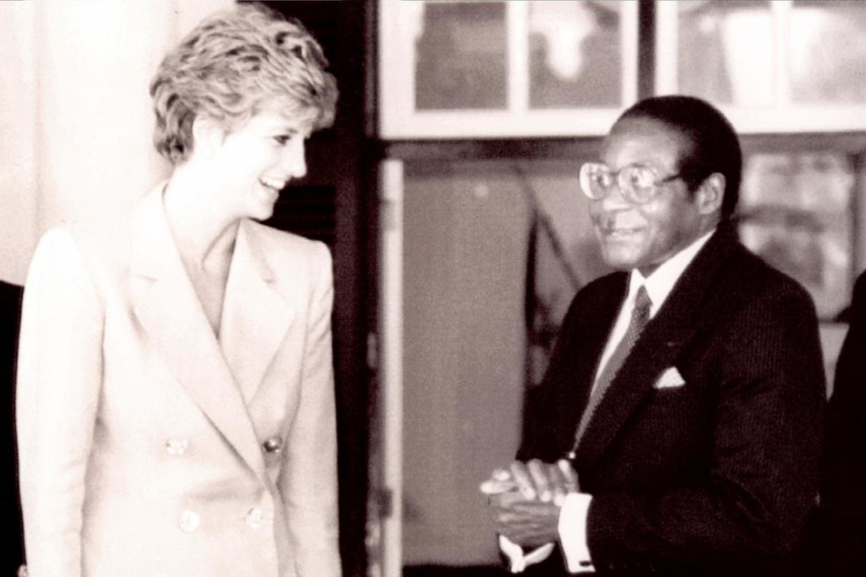 Diana, Princess of Wales, talking with Zimbabwean President Robert Mugabe: REUTERS