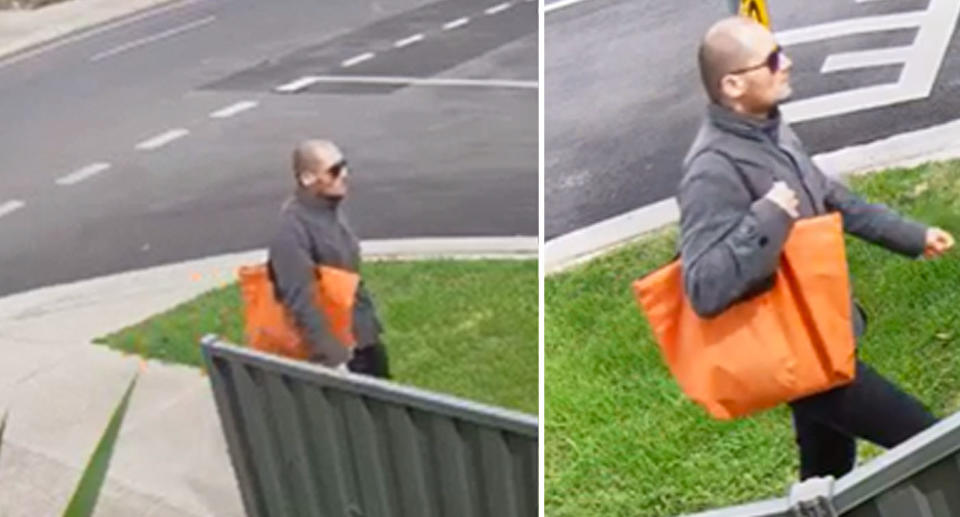 Pictured is the man in a grey jacket walking along the street in Wyndham Vale with a distinct orange bag. 